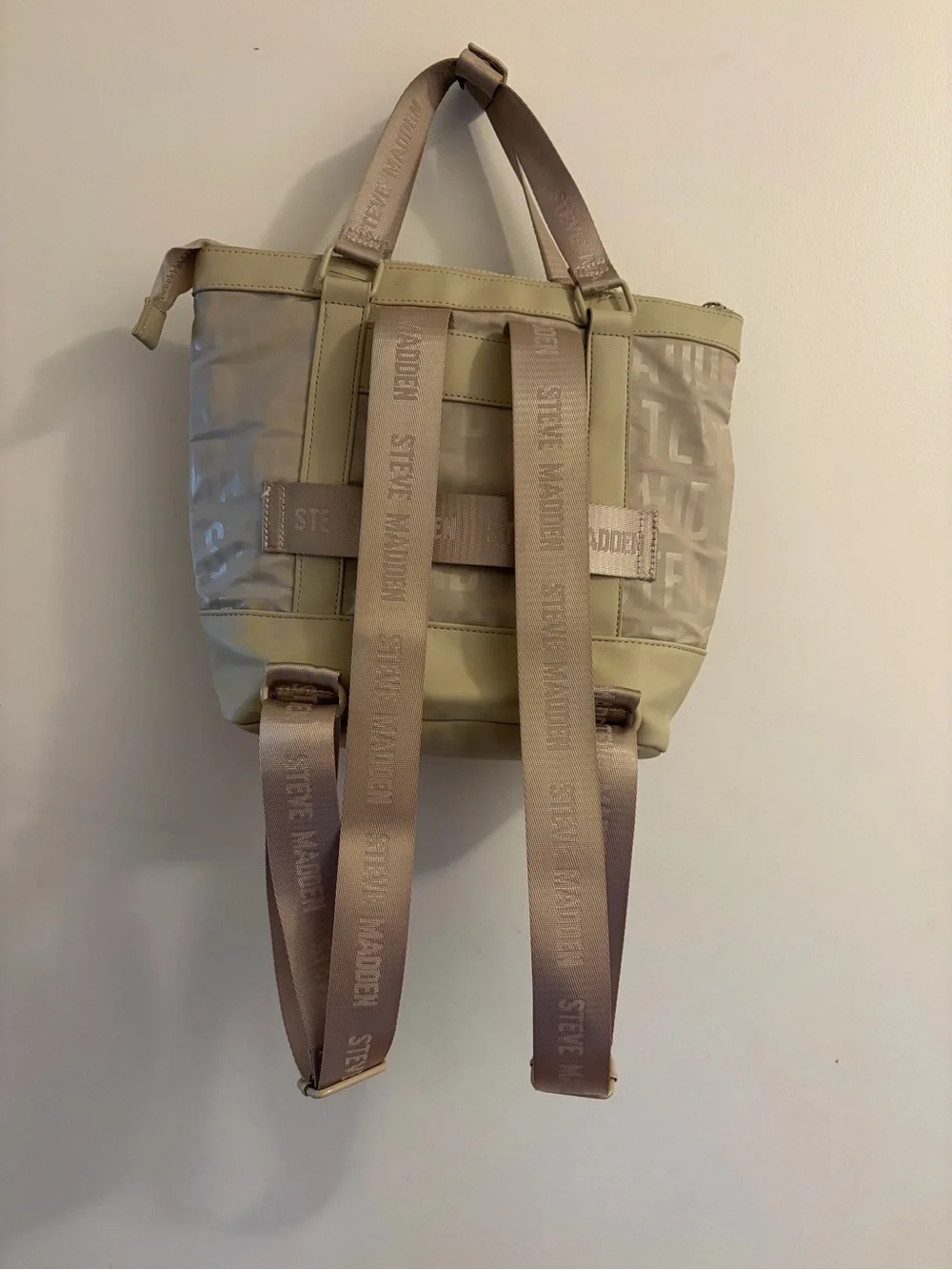 Steve Madden backpack featuring a smaller matching pouch attached